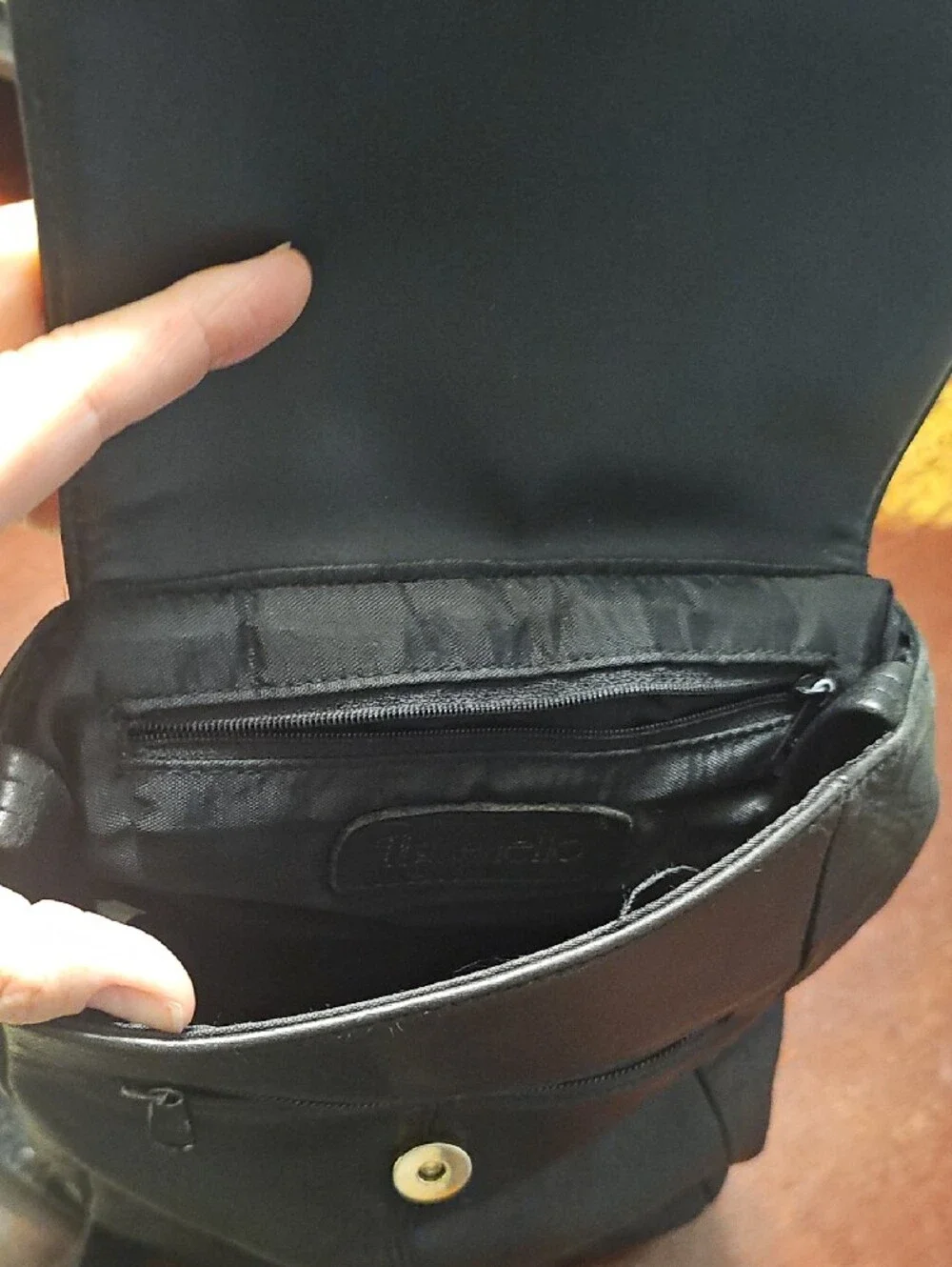 Tignanello Black Leather Backpack with Gold Hardware